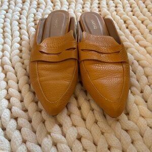Kaanas Mustard Textured Loafers
